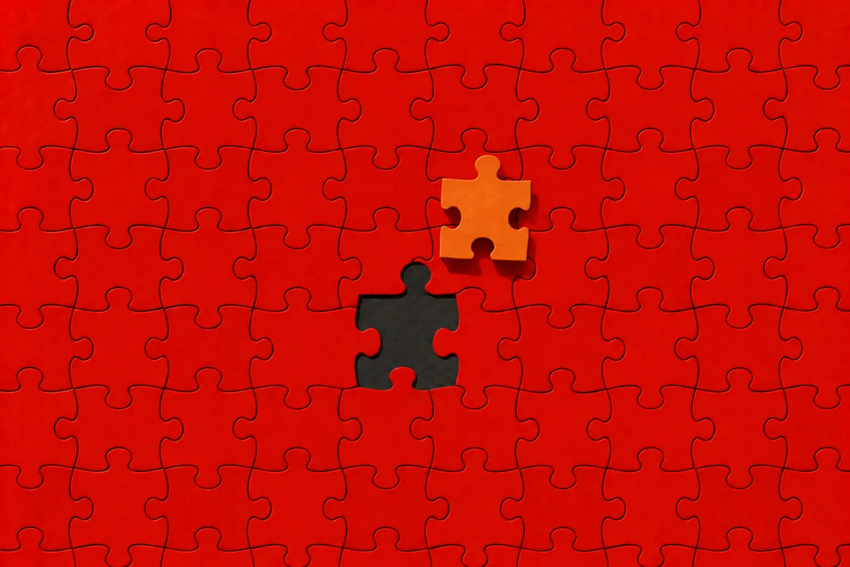The missing piece fitting into a puzzle
